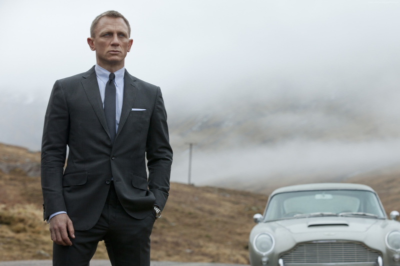actor, adult, outdoors, business, well-dressed, day, standing, James Bond, businessman, business person, front view, males, contemplation, car, three quarter length