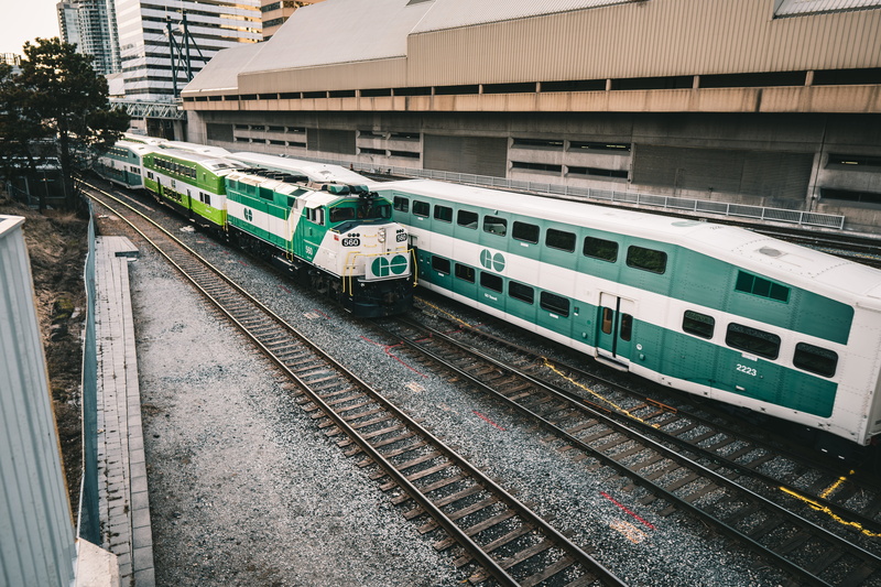 jar, outdoors, garden, green, locomotive, railroad car, city, plant, tunnel, vehicle, station, railroad station platform, vase, potted plant, train track