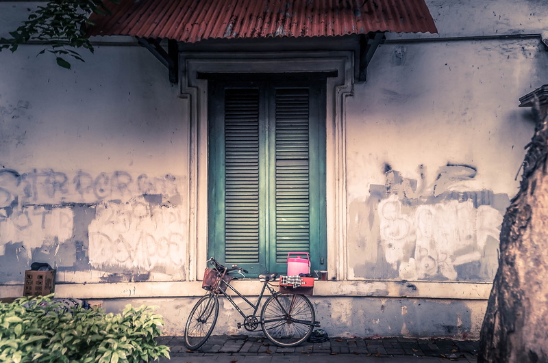 city, built structure, building, pavement, indonesia, stationary, potted plant, no people, day, white, vehicle, sidewalk, wall - building feature, cobblestone