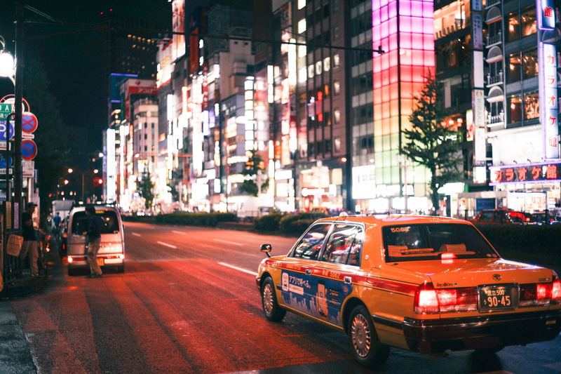 cab, illuminated, asia, taxi, street, motor vehicle, mode of transportation, sedan, night, on the move, japan, architecture, blue, motion, plant, flora