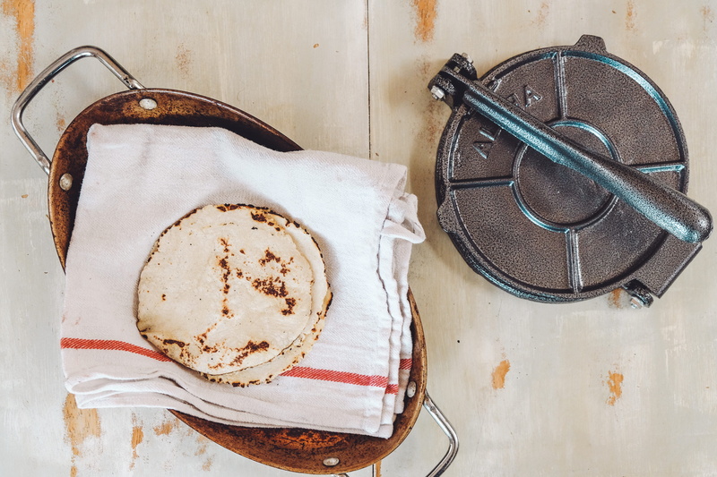 bread, spoon, directly above, towel, jar, dessert, home decor, eating utensil, dish, indoors, tortilla, textile, tacos, maker, furniture, potted plant