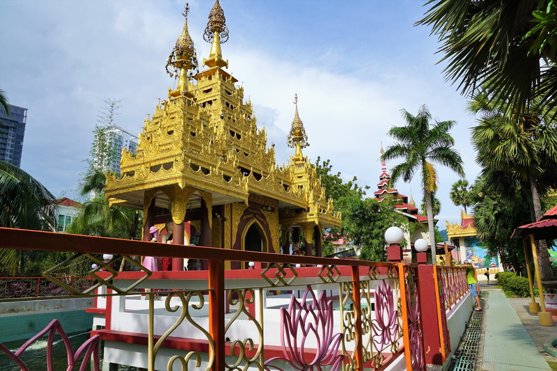 tourism, day, wall, outdoors, antiquity, wat chayamangkalaram, built structure, building, place of worship, relaxation, architecture, sky, background, ornament