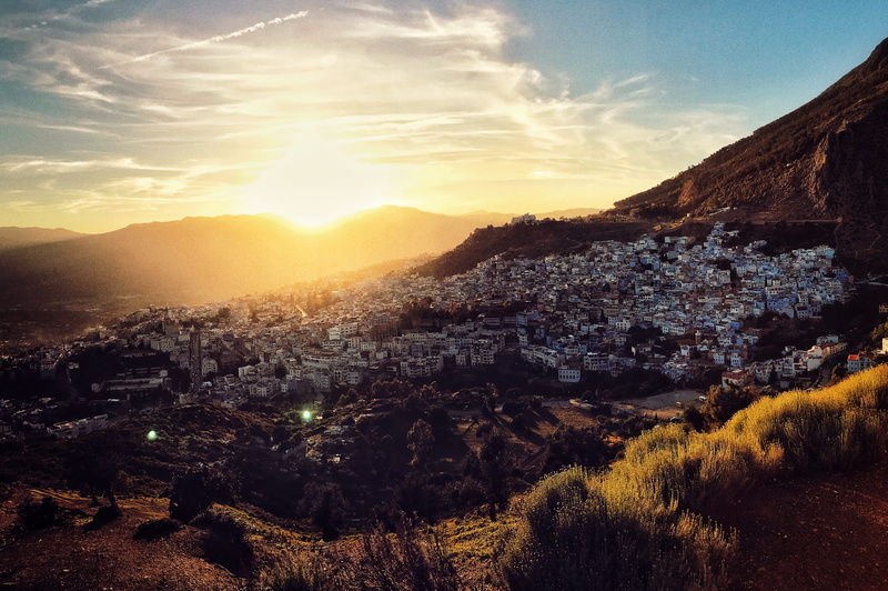 mountain, cityscape, nature, scenics - nature, sky, sun, sunlight, environment, lens flare, tree, tranquility, cloud - sky, built structure, landscape