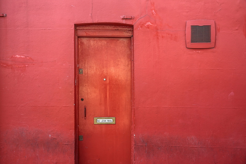 brick, wall, curtain, bonsai, potted plant, shutter, communication, built structure, safety, door, red, walkway, tree, jar, vase, security, window, pink color