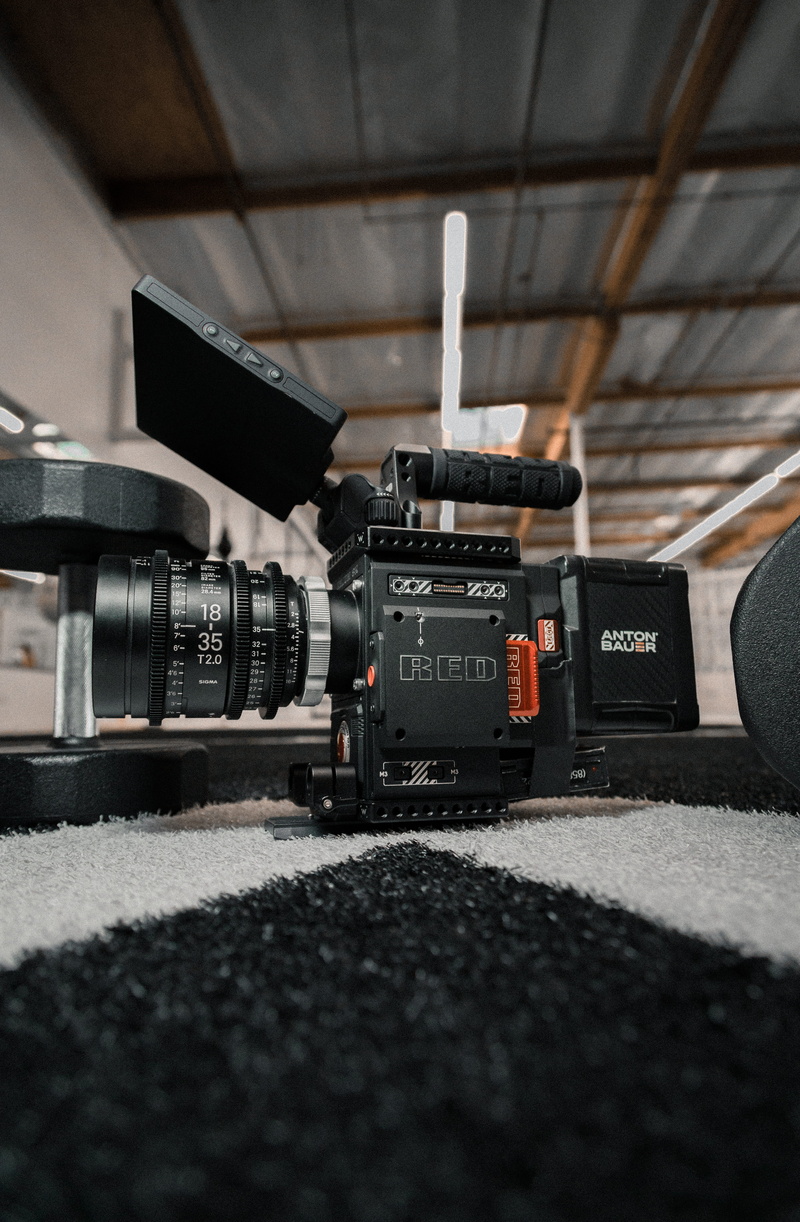 table, still life, cinematography, technology, selective focus, bokeh, gear, videocamera, detail, camera, black, day, indoors, set life, public transportation
