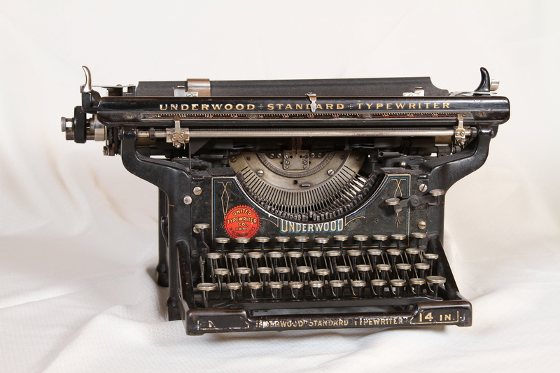 text, type, antique, no people, keyboard, letter, writing, typescript, silver, black, indoors, key, machine, mechanical, alphabet, old, equipment, technology