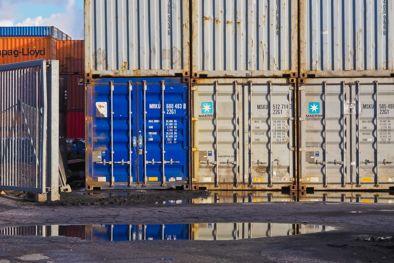 marketing hub, trade, mode of transportation, day, cargo, port, cargo container, outdoors, pier, traffic, commercial dock, delivery, blue, industry, reflection