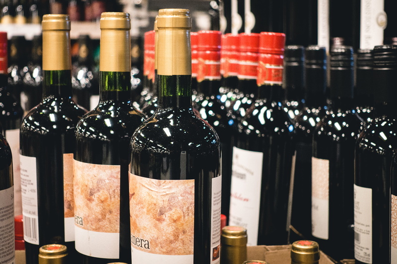 indoors, red Wine, drink, wineglass, wine, wine Bottle, food and drink, glass - Material, container, large group of objects, bottle, in A Row, choice, freshness