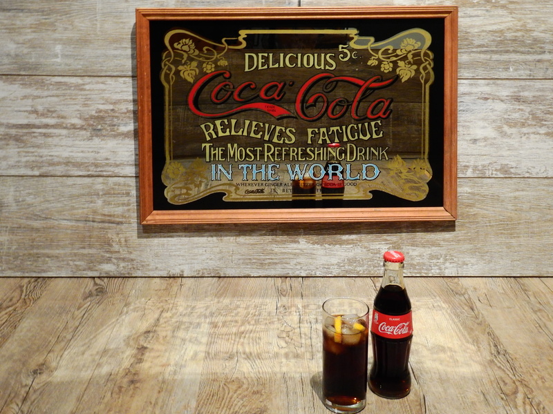 script, sugar, advertising sign, cafe, bottle, restaurant, sweet, table, Coke, cola, ice, advertising, container, wood - material, day, logo, still life