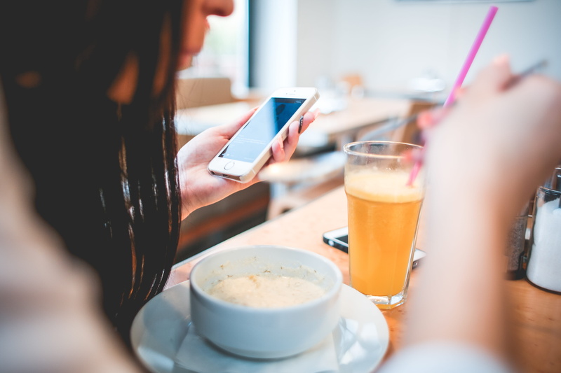 casual Clothing, adult, coffee Shop, internet, hand, glass, human body part, indoors, wireless Technology, food and drink, human hand, Lunch, females, connection