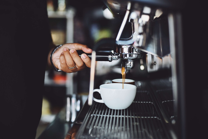 cup, coffee, refreshment, coffee maker, coffee shop, light, bar, espresso maker, preparation, machinery, human hand, food, work, service, indoors, man