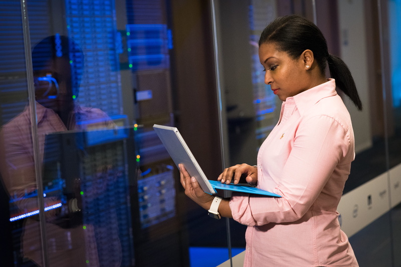businesswoman, commerce, women, woman, communication, reflection, office, light, city, wireless technology, wearing, room, working, business person, internet