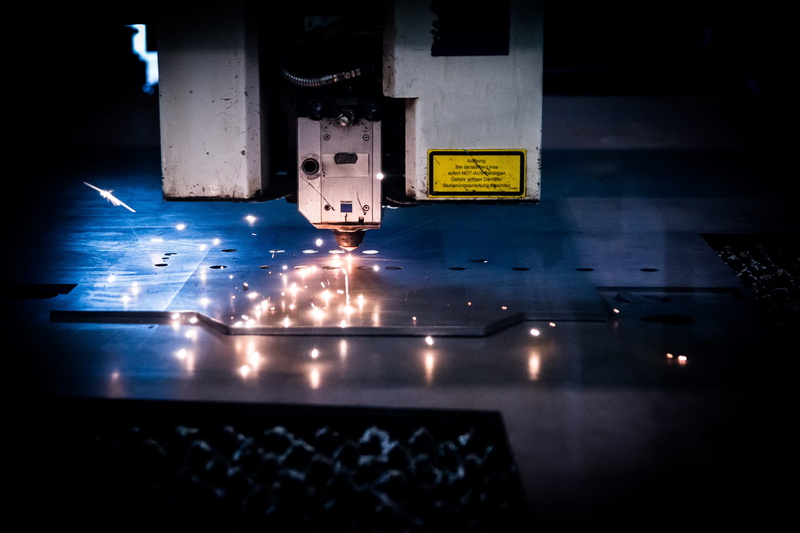 metal working, indoors, technology, flooring, industry, light - natural phenomenon, water, the device, company, plasma, motion, laser cutting, equipment
