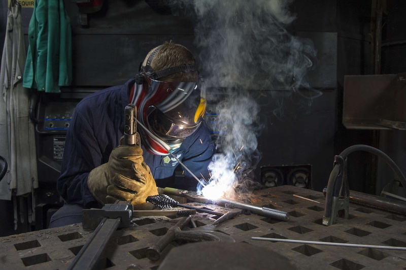 heat - temperature, build, workshop, worker, working, men, real people, obscured face, smoke - physical structure, occupation, helmet, protection, construction