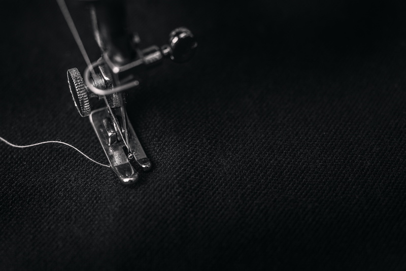 selective focus, studio shot, technology, foot, arts culture and entertainment, sewing, metal, 5K, wear, clothing, photography, single object, indoors