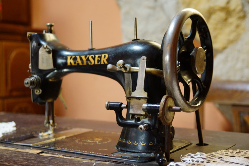 material, workshop, sewing, close-up, equipment, indoors, antique, connection, focus on foreground, textile, 5K, machinery, clothing, manufacturing equipment