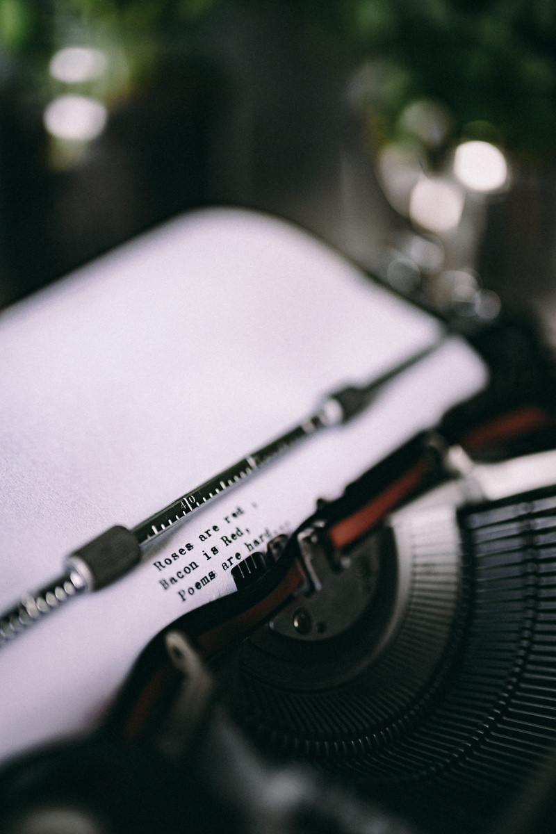 outdoors, 5K, typewriting, indoors, quote, text, no people, still life, gun, focus on foreground, table, weapon, publication, paper, typewriter, typing