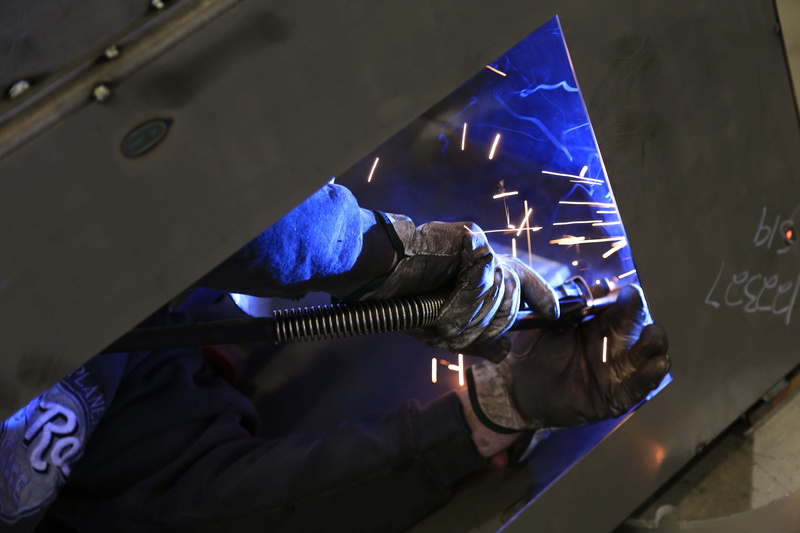 metalwork, indoors, protective workwear, real people, metal industry, skill, weld, man, industry, factory, protective glove, adult, worker, labor, men