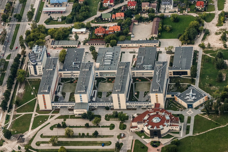 outdoors, architecture, aerial photo, high angle view, car, aerial view, city, tree, polytechnic university which, building exterior, day, motor vehicle