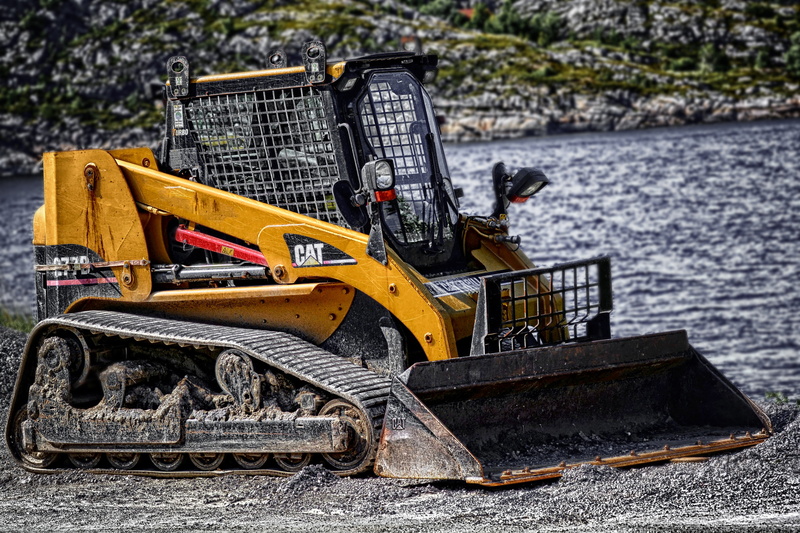 caterpillar, outdoors, abandoned, mode of transportation, yellow, machinery, land vehicle, no people, digger, wood - material, earth mover, heavy, machine