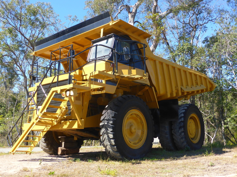dumper, heavy, big, large, sky, trucking, sunlight, no people, wheel, land vehicle, construction machinery, tipper, road, truck, sunny, nature, outdoors