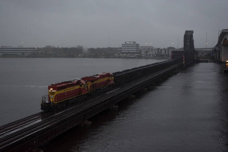 mode of transportation, rail transportation, architecture, business, water, public transportation, nature, waterfront, track, sky, transportation, freight transportation