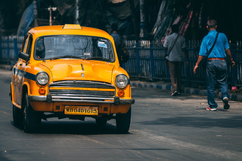 5K, street, car, real people, urban, minibus, motor, road, person, engine, rear view, automobile, outdoors, day, motor vehicle, bus, people, machine, full length