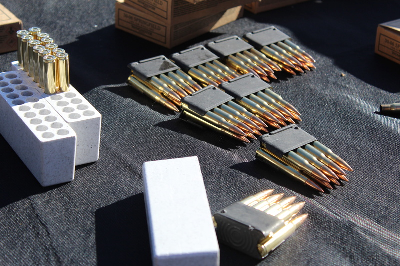 metal, sunlight, protection, table, guns, high angle view, no people, sniper, security, equipment, indoors, music, arts culture and entertainment, sound recording equipment
