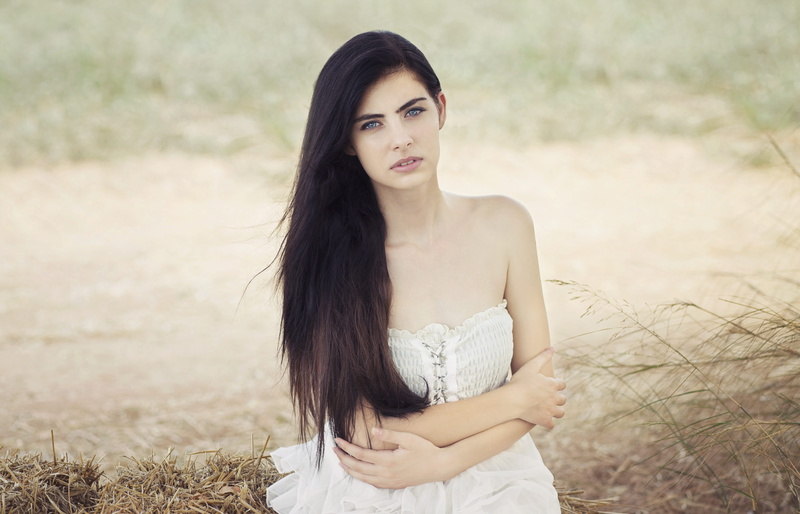 person, neckline, women, standing, wearing, outdoors, focus on foreground, apparel, land, beauty, evening dress, portrait, young women, gown, hair, sleeve