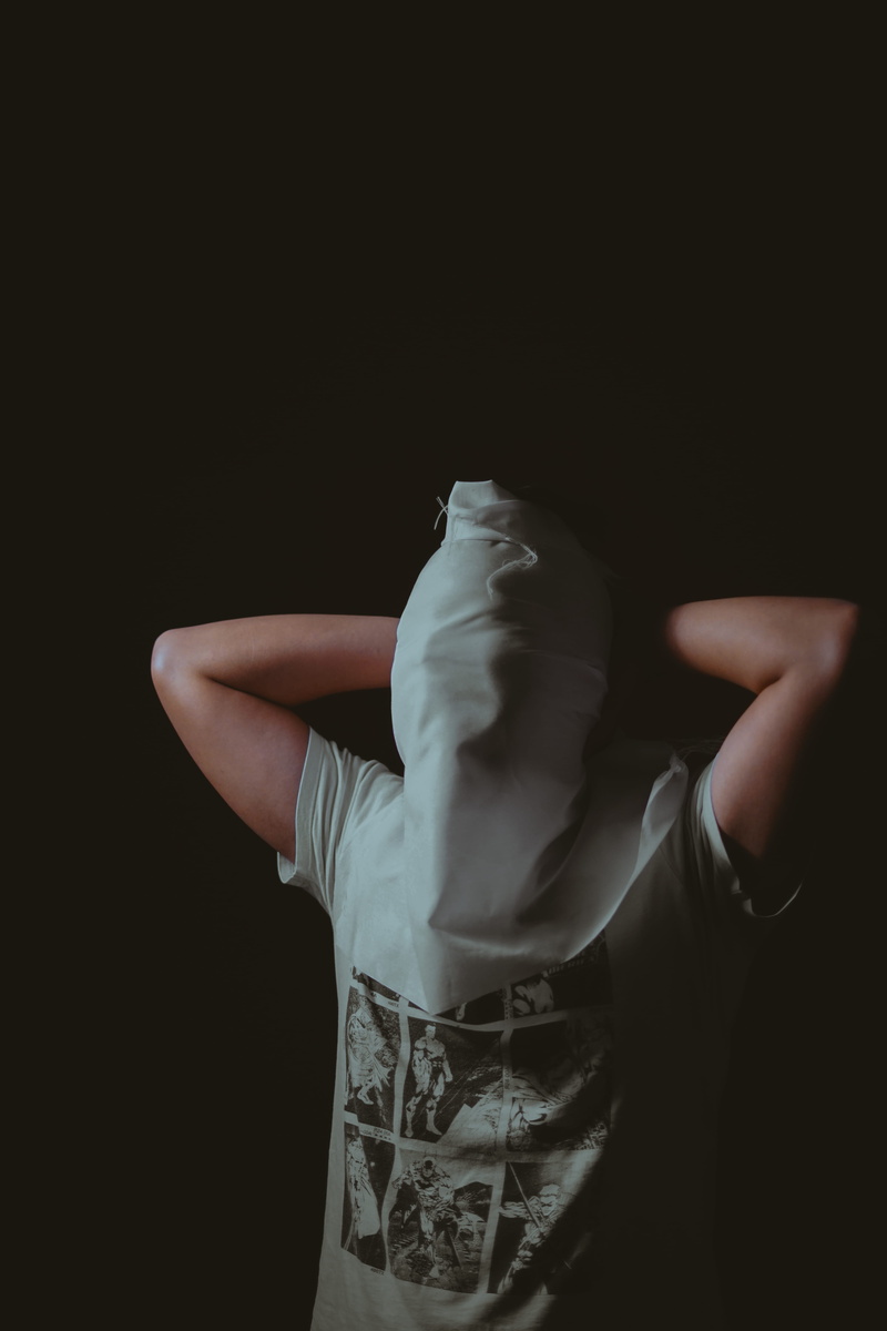 obscured face, real people, three quarter length, long sleeve, 5K, young adult, apparel, cloth, finger, standing, fashion, man, waist up, photostudio