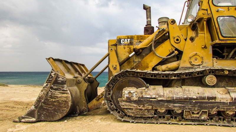 bulldozer, caterpillar, day, nature, earth mover, no people, vehicle, excavator, equipment, powerful, road, construction equipment, outdoors, transportation