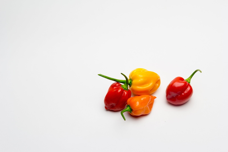 copy space, no people, orange, healthy eating, spicy, spice, peppers, vegetable, studio shot, 4K, aji, yellow, indoors, group of objects, wellbeing, bell pepper