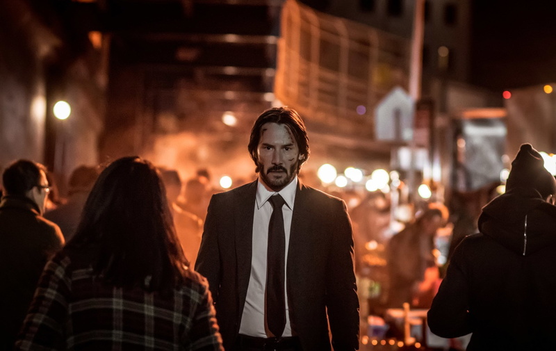 John Wick: Chapter 2, group of people, well-dressed, 1080P, focus on foreground, city, Keanu Reeves, standing, men, adult, crowd, night, architecture