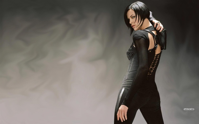 indoors, black, portrait, one person, s, young women, Charlize Theron, long hair, Aeon Flux, long, women, standing, gray background, black hair, three quarter length