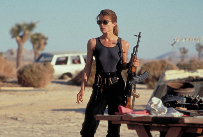 gun, security, Terminator 2: Judgment Day, young adult, s, adult, day, women, standing, 1080P, handgun, beautiful woman, fashion, top, one person, warning sign