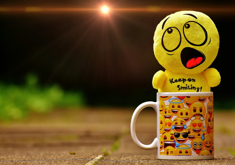 emotions, absence, food and drink, outdoors, mug, emoji, refreshment, drink, single object, cup, yellow, white, toy, representation, surprised, print, close-up