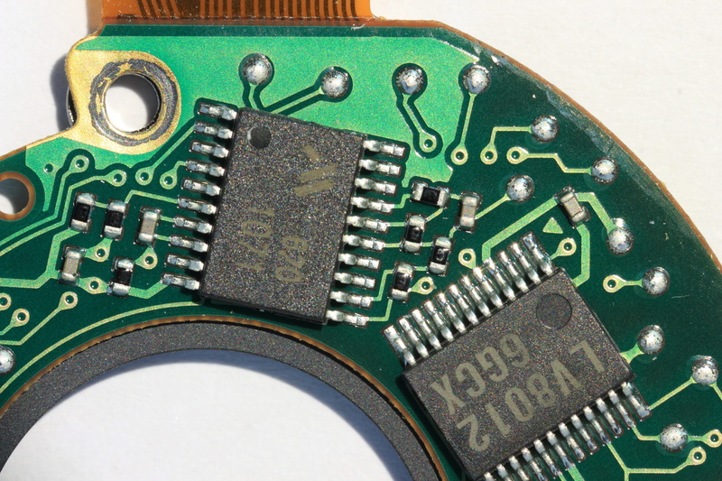 canon, single object, circuitry, power supply, circuit, surface, connection, cpu, no people, mechanism, electrical equipment, industry, equipment, indoors