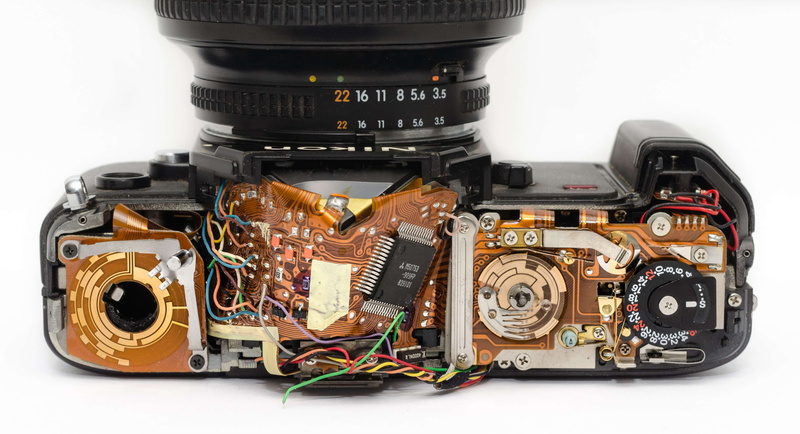 camera, cut out, close-up, single object, white background, circuitry, broken, indoors, multi colored, photography, equipment, music, photography themes