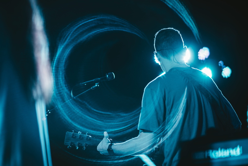 music, t, reflection, playing, nightlife, bright, arts culture and entertainment, looking, light - natural phenomenon, waist up, club dj, love, grain, wearing