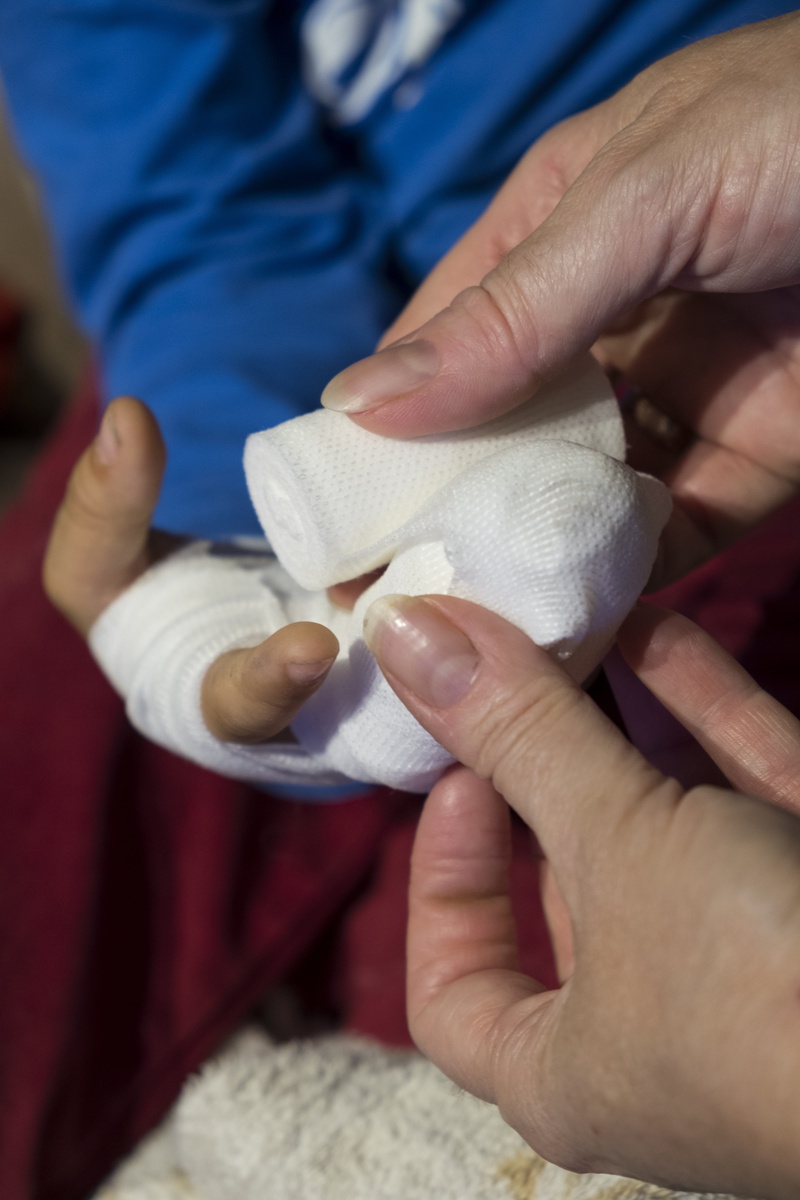 first aid, people, 5K, finger, focus on foreground, hospital, injured, human body part, care, nurse, women, indoors, two people, adult, human hand, boy