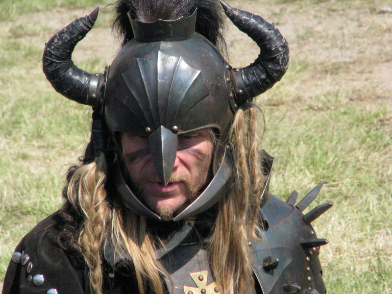 one person, close-up, horned, sport, army, front view, military, black metal, warrior, day, sunlight, herbivorous, mammal, people, clothing, weapon, 1080P
