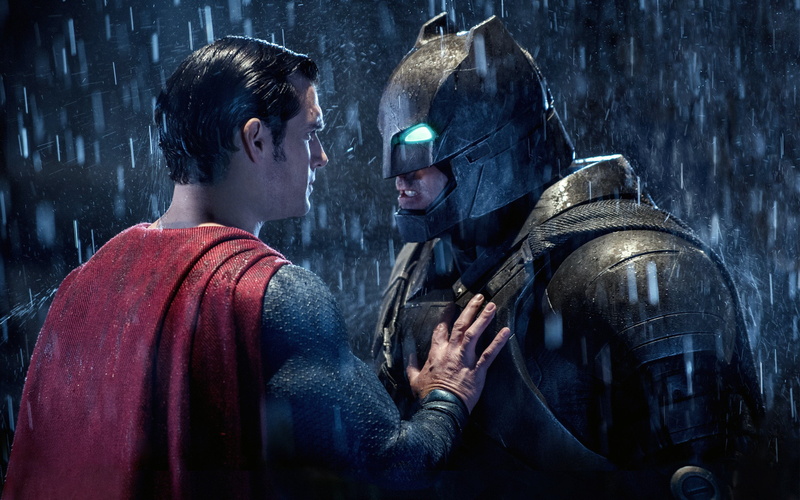 indoors, architecture, people, casual clothing, batman vs superman, two people, sitting, young men, lifestyles, super heroes, males, hairstyle, superman