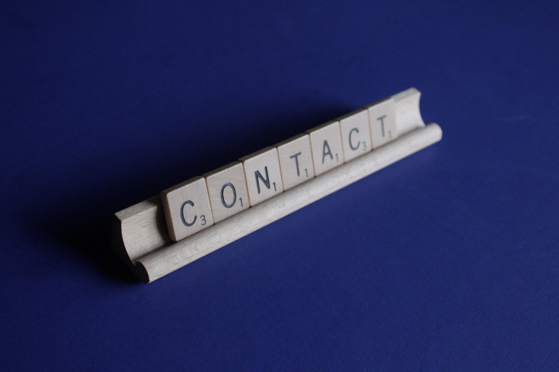 scrabble, wood - material, indoors, simplicity, communicate, copy space, contact us, word, western script, studio shot, domino, minimal, black background