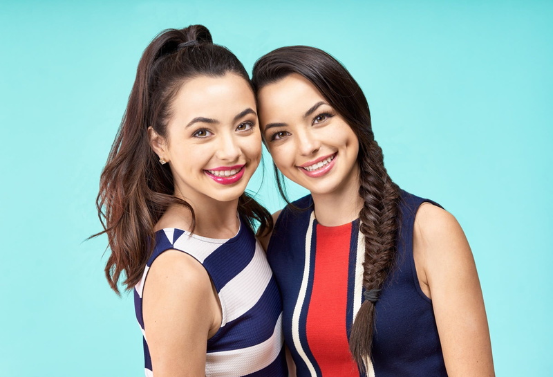 simple background, model, 1080P, Veronica Merrell, looking at viewer, braids, The Merrell Twins, pink lipstick, women, blue background, twins, ponytail