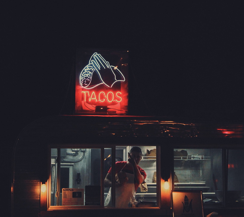 men, people, brown, food, urban, women, architecture, communication, illuminated, neon, mobile, tacos, inside, outdoors, stall, standing, built structure
