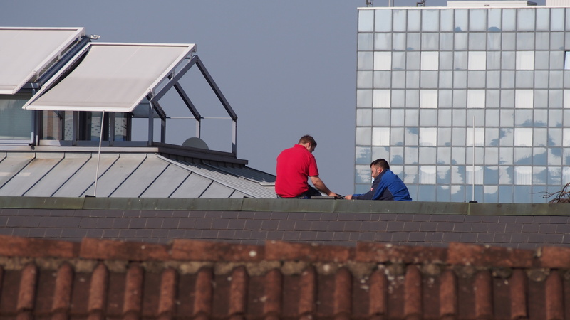 architecture, fear of heights, men, cooperation, nature, built structure, roofers, males, building exterior, togetherness, building, people, roof, communication