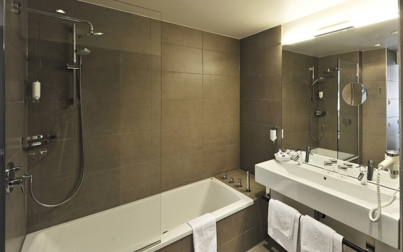 public building, mirror, indoors, decor, tiled Floor, no People, design, bathroom, furniture, white, style, domestic Bathroom, shower, home, luxury, sink