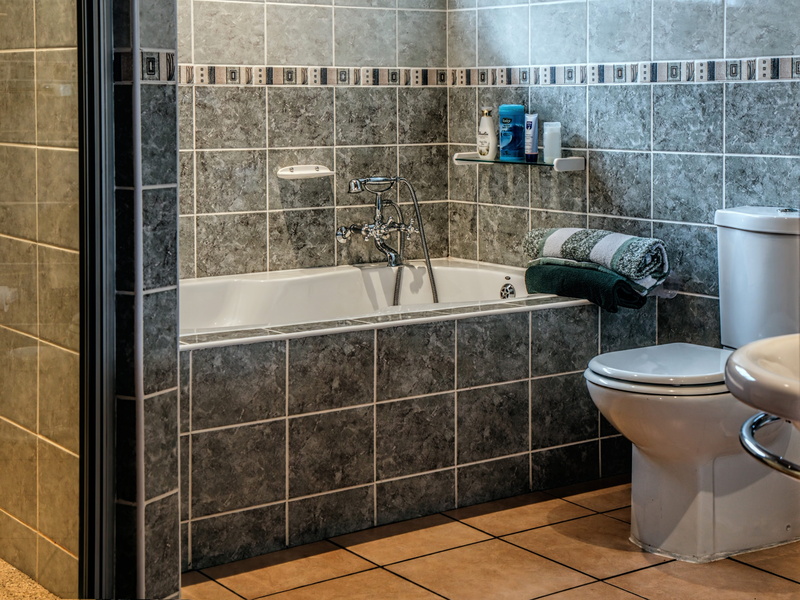 no people, faucet, toilet bowl, house, bathroom, bowl, tile, indoors, bathroom sink, bathtub, reflection, clean, public restroom, hygiene, white, towel