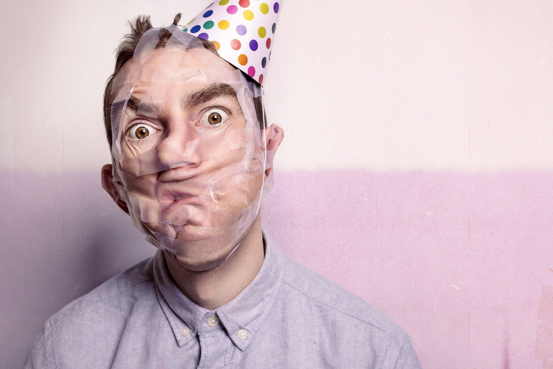 button-up, innocence, button, indoors, portrait, adult, hat, child, head And Shoulders, whimsical, gray, offspring, one Person, front view, tape, goofy