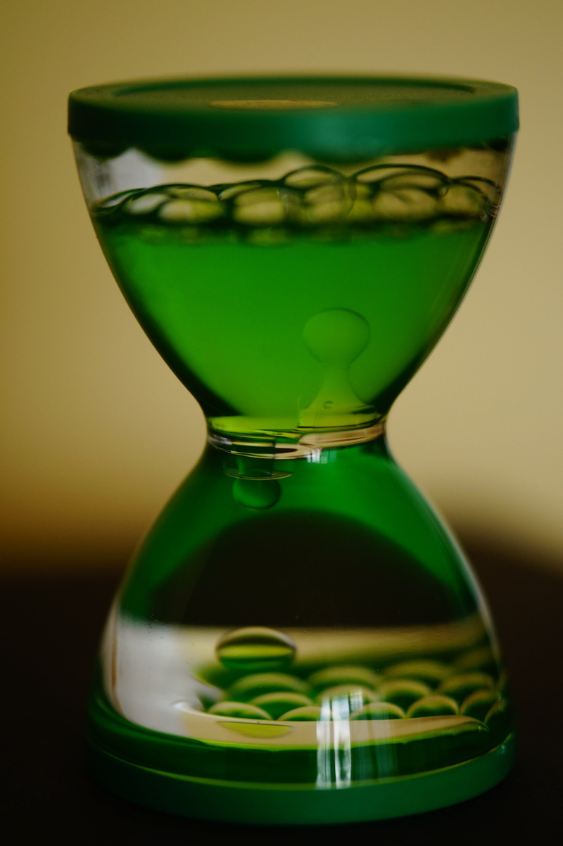 blow, play, bottle, decoration, green color, reflection, no people, glass, transparent, focus on foreground, freshness, water feature, 5K, colored background